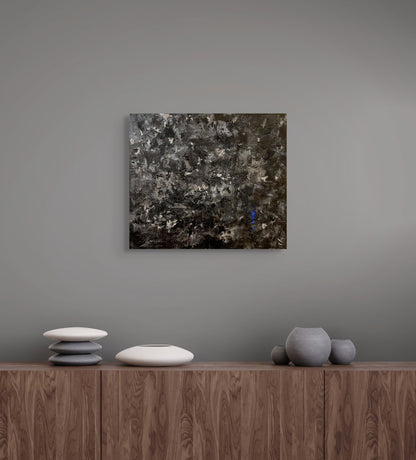vivi & vela artwork display for 'black tourmaline': Wall-mounted abstract artwork in a modern living space, showcasing deep black and textured tones.