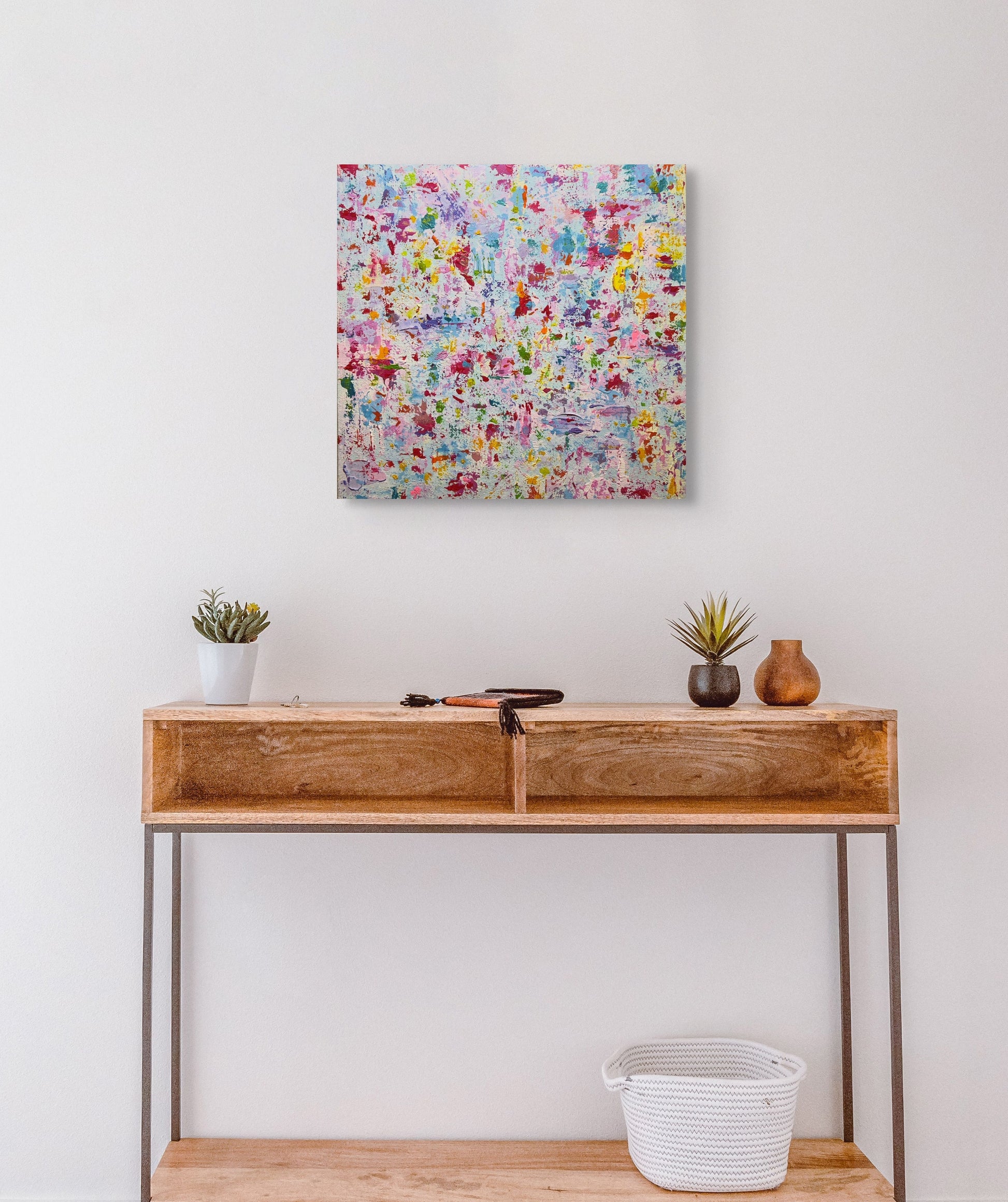 vivi & vela artwork display for 'bloom': abstract artwork in a modern interior, showcasing the vibrant, energetic tones of spring and floral forms.