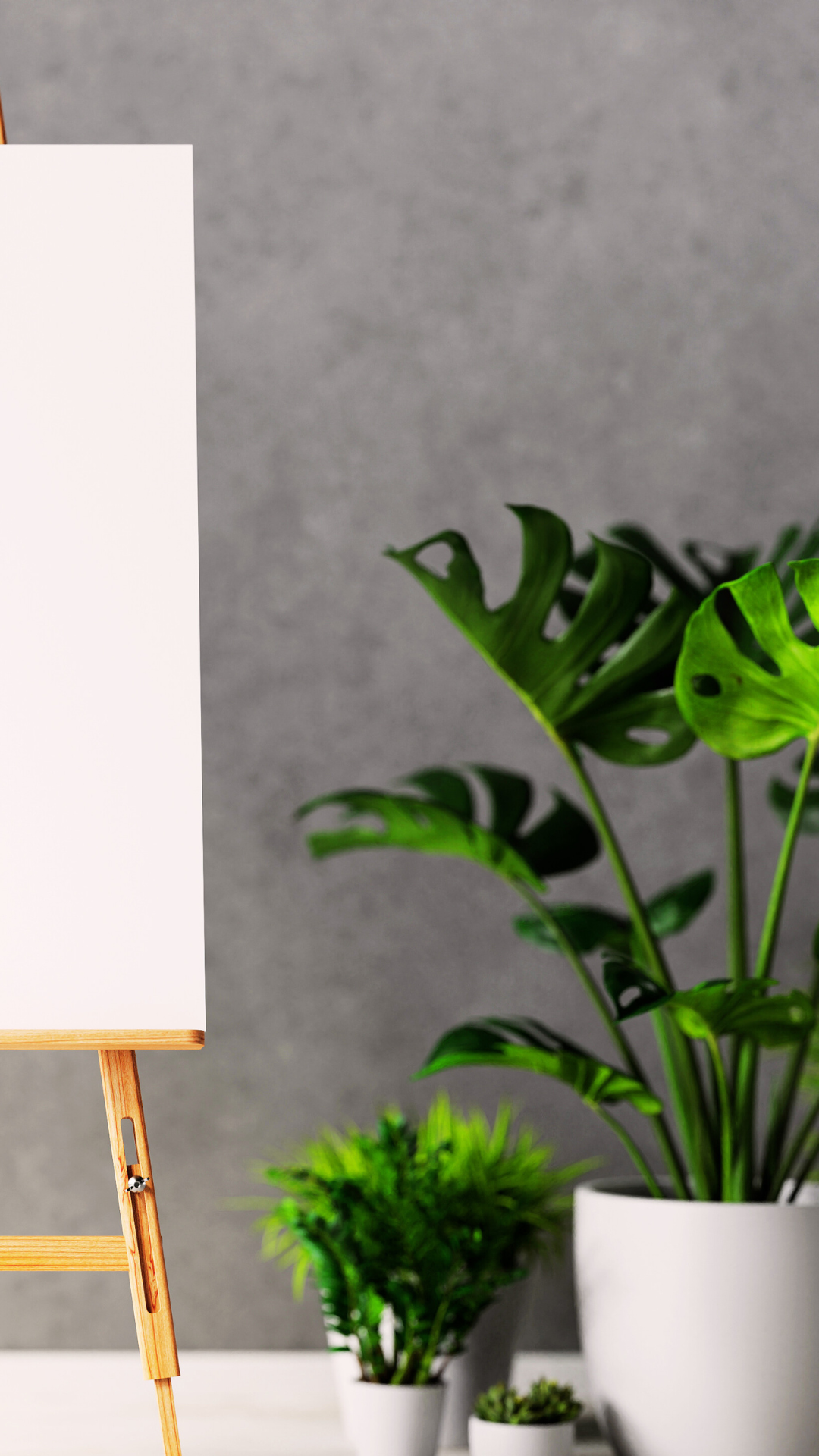 vivi & vela commissions - blank canvas with greenery, symbolizing the beginning of a custom art piece