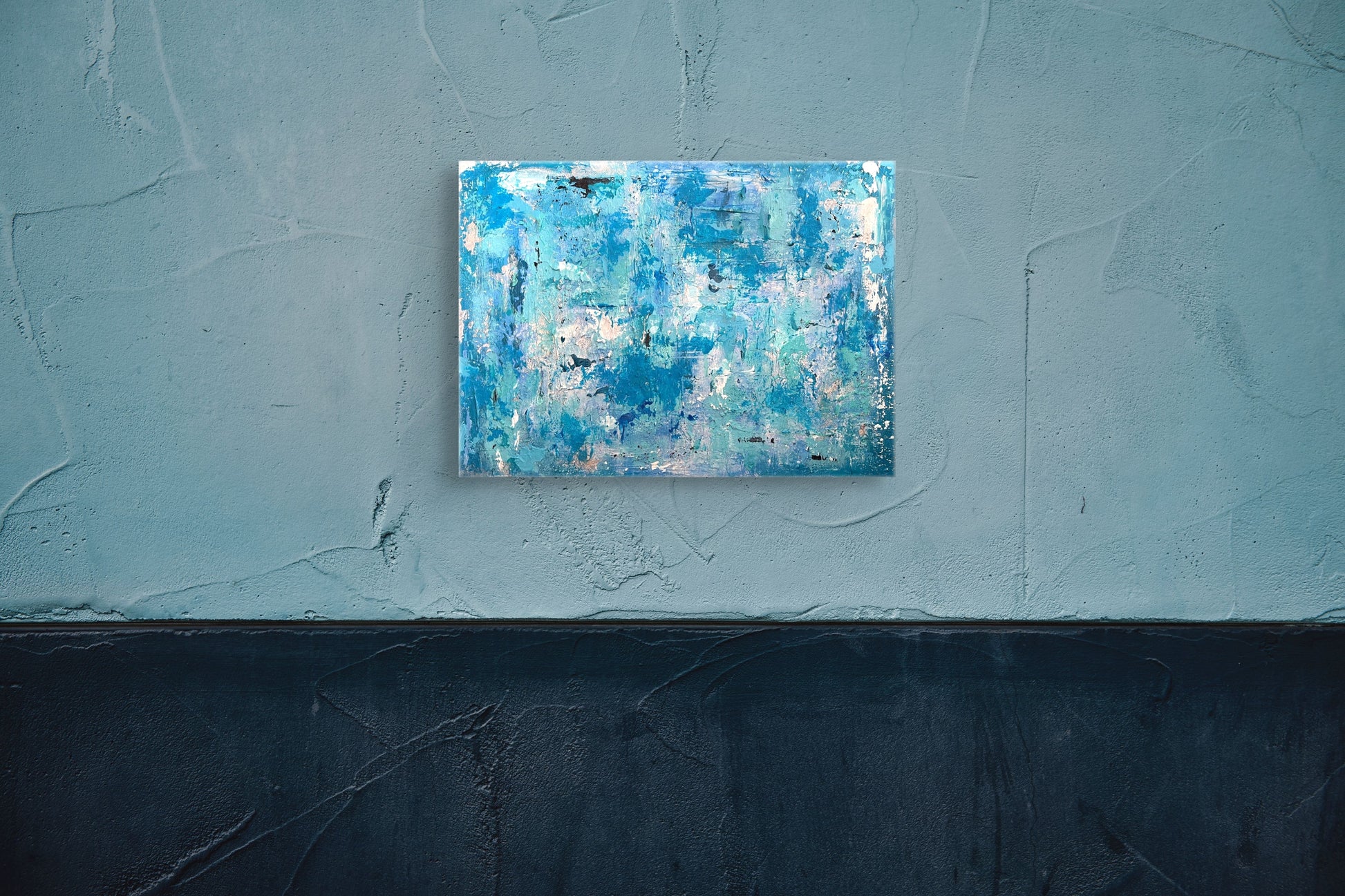 vivi & vela artwork display for 'denim': abstract artwork in a modern interior, highlighting calming blues and metallic elements inspired by denim and waves.