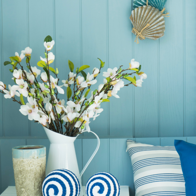 vivi & vela denim inspiration - coastal home decor with white flowers and soft blue accents
