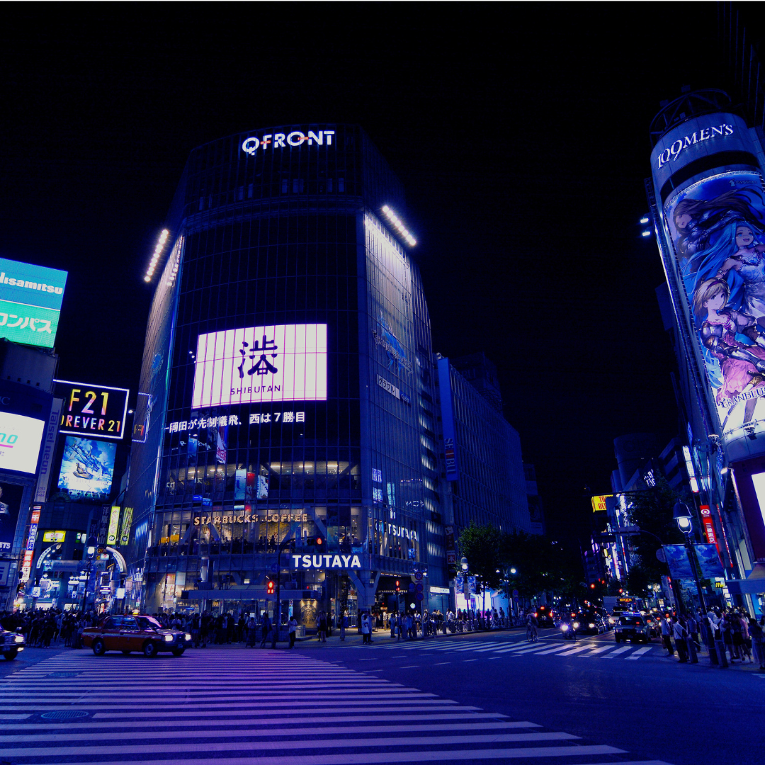 vivi & vela midnight inspiration - neon billboards glowing in Shibuya crossing at midnight
