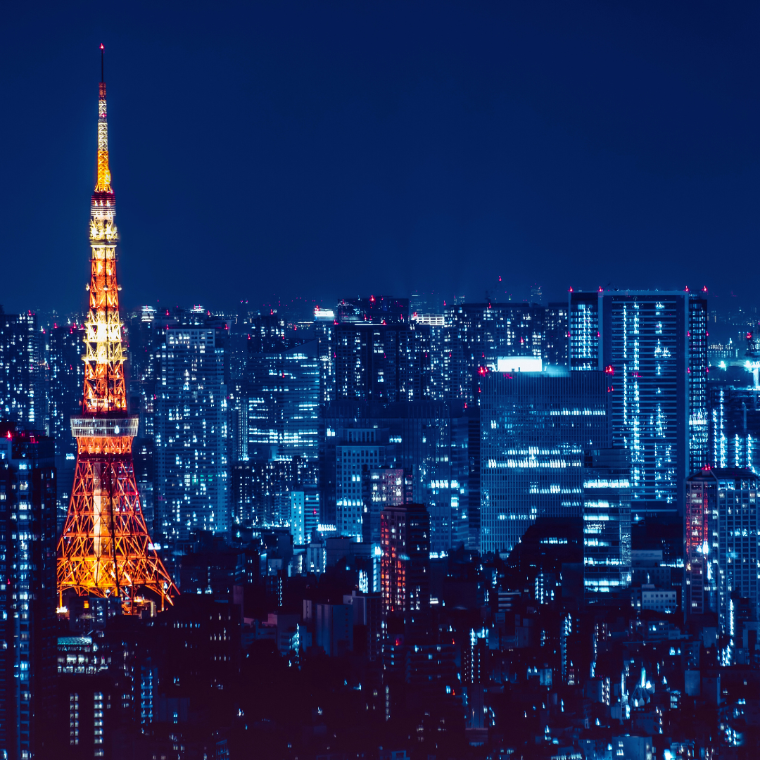 vivi & vela midnight inspiration - Tokyo skyline at night with vibrant city lights and Tokyo Tower illuminated